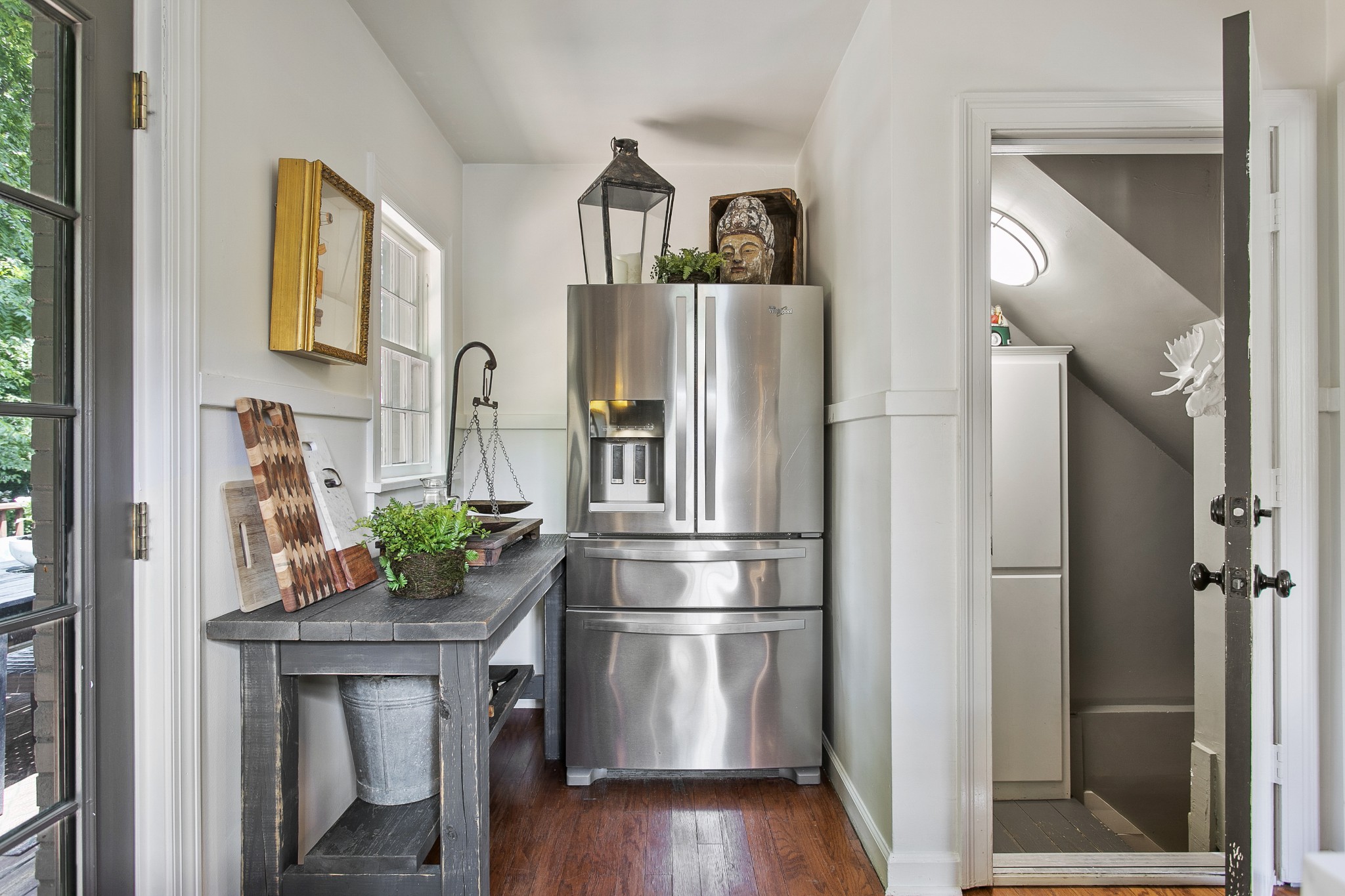 130 Spring Valley Road Nashville, TN 37214 - Photo 29 of 46 a kitchen with stainless steel appliances a refrigerator and a wooden floor