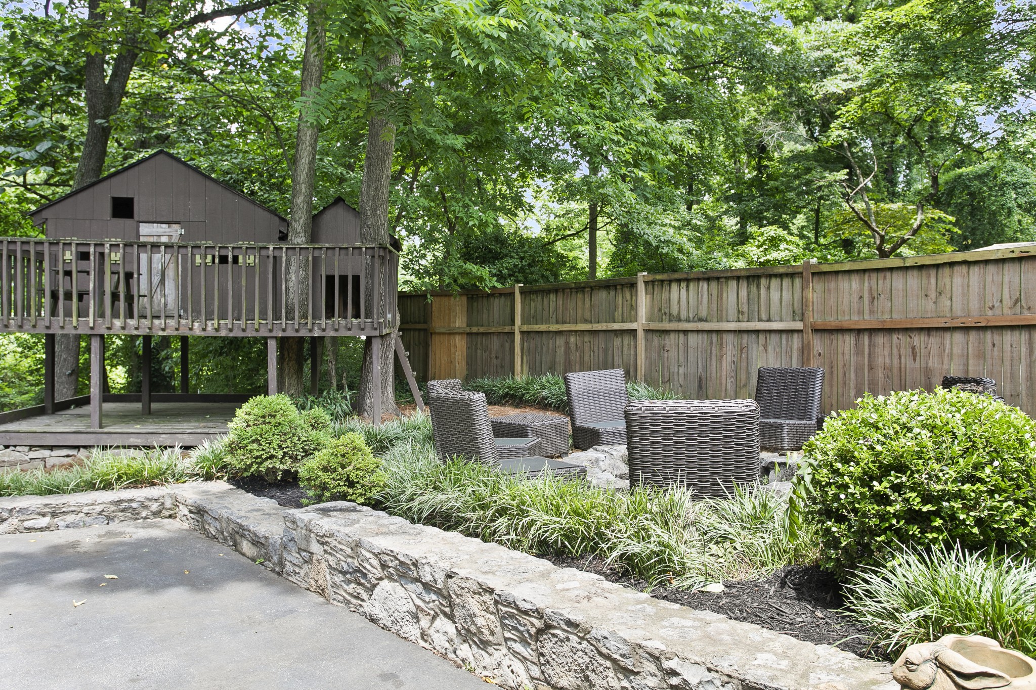 130 Spring Valley Road Nashville, TN 37214 - Photo 36 of 46 a view of a garden with a deck