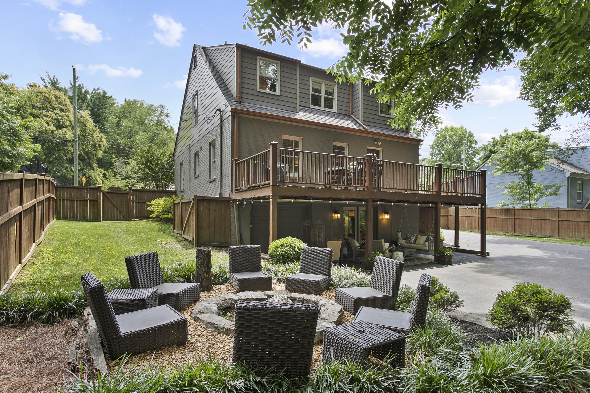 130 Spring Valley Road Nashville, TN 37214 - Photo 38 of 46 a view of a patio with couches chairs and a fire pit with an outdoor seating
