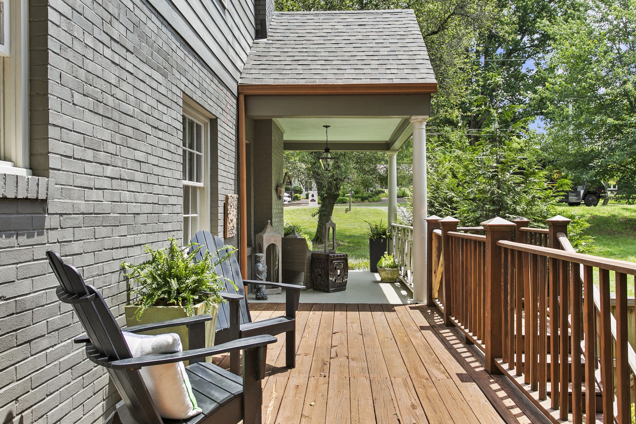 130 Spring Valley Road Nashville, TN 37214 - Photo 41 of 46 a view of a wooden chairs and table in the balcony