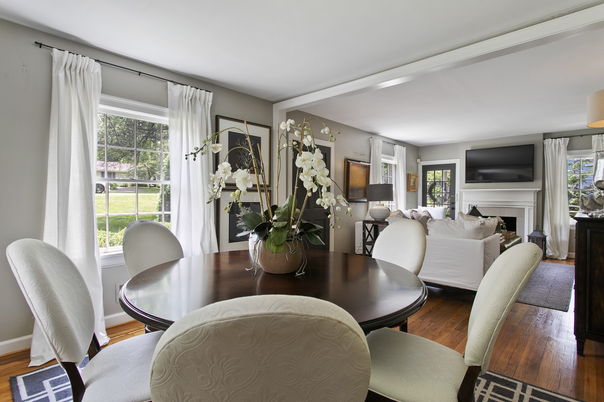 130 Spring Valley Road Nashville, TN 37214 - Photo 9 of 46 a view of a dining room with furniture window and wooden floor