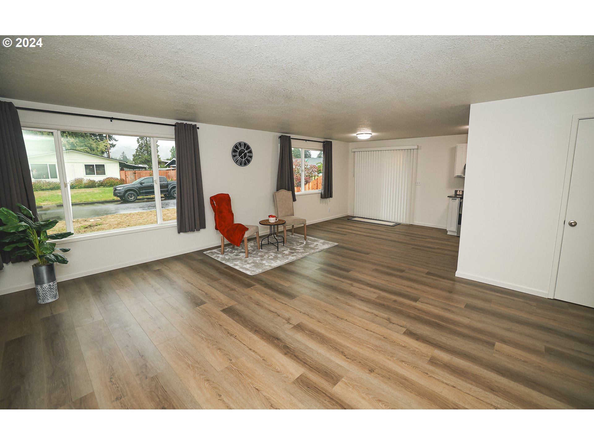 5979 E Street Springfield, OR 97478 - Photo 10 of 17 a view of a living room and floor to ceiling window