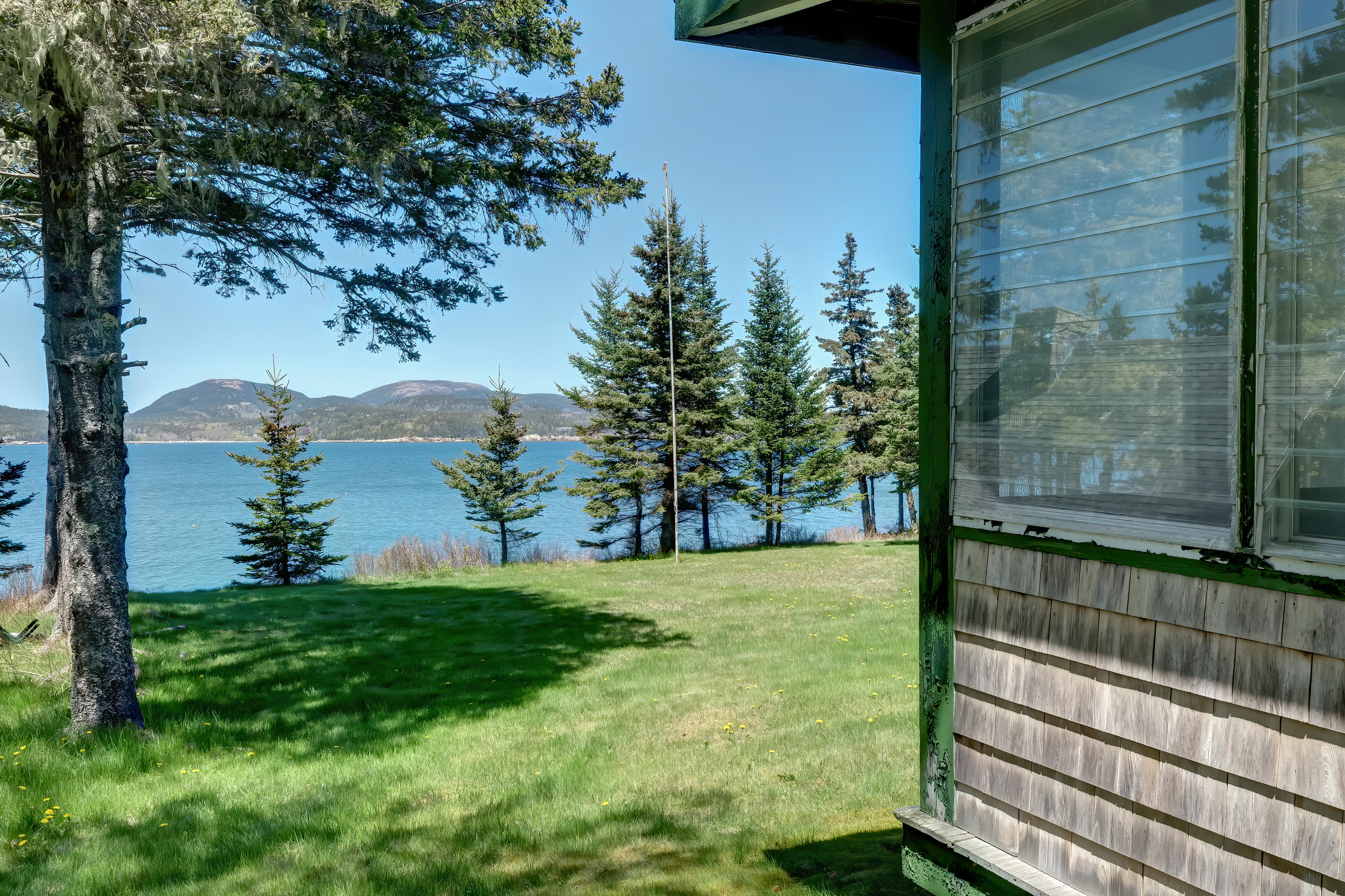 56 Mosswood Road Cranberry Isles, ME 04646 - Photo 27 of 40 Mosswoodporchwithview