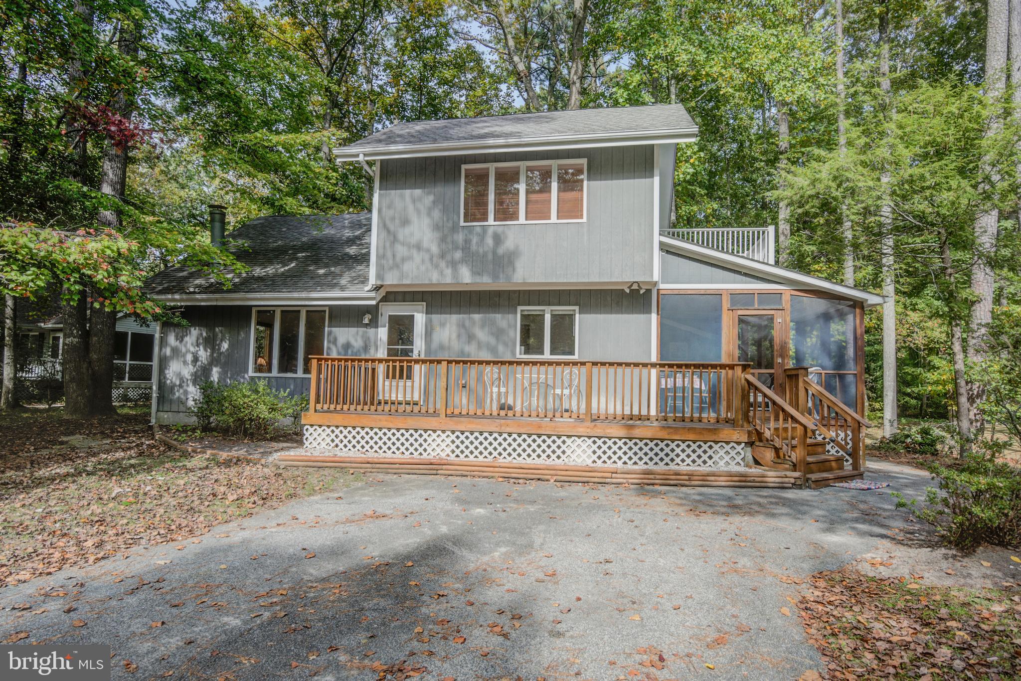 19 Capetown Road Ocean Pines, MD 21811 - Photo 1 of 56 a front view of a house with a yard