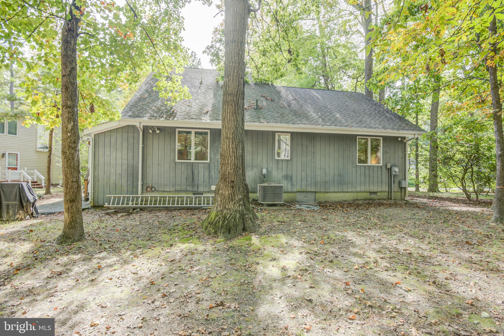 19 Capetown Road Ocean Pines, MD 21811 - Photo 17 of 56 a view of a house with a yard