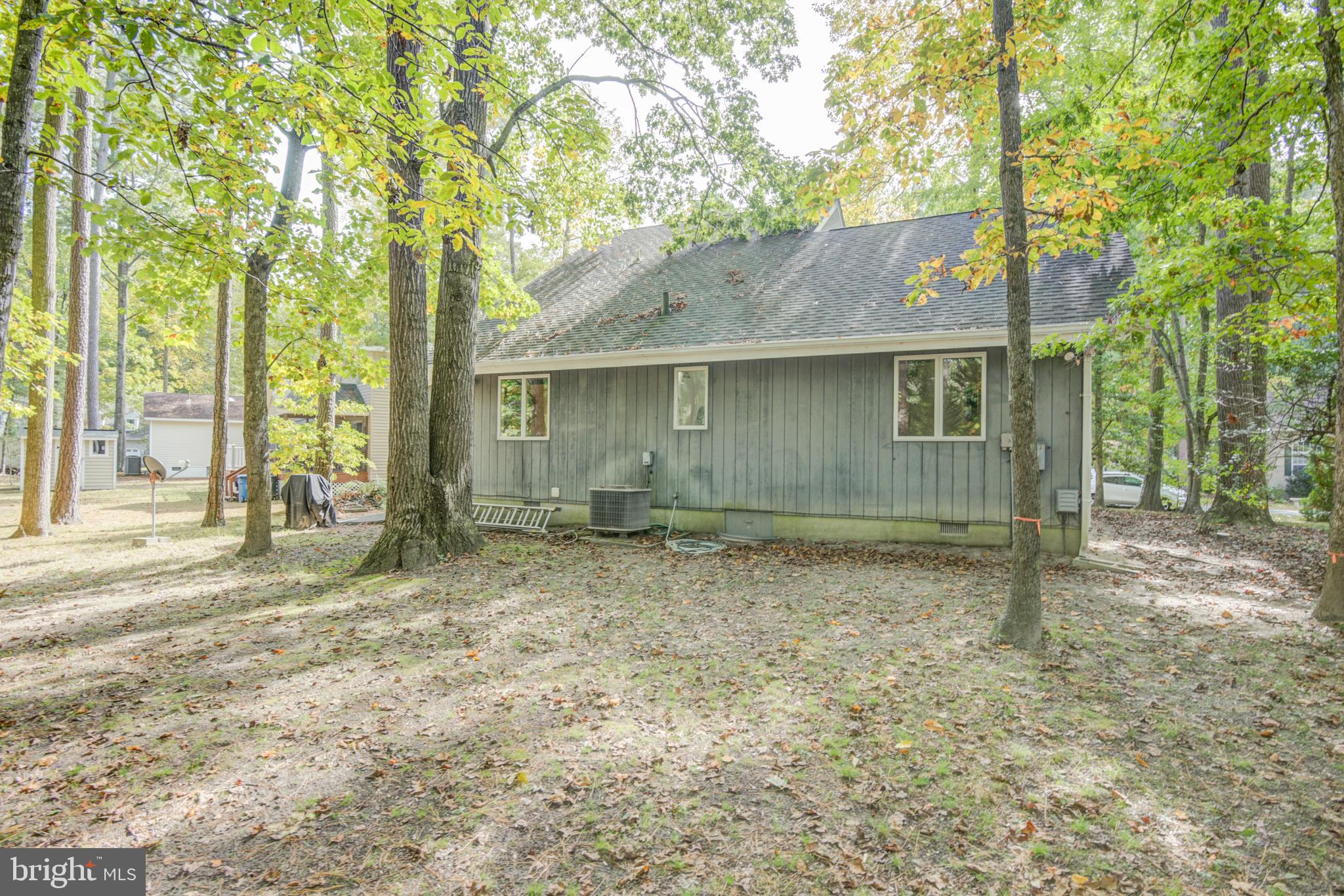 19 Capetown Road Ocean Pines, MD 21811 - Photo 18 of 56 a house view with a backyard space