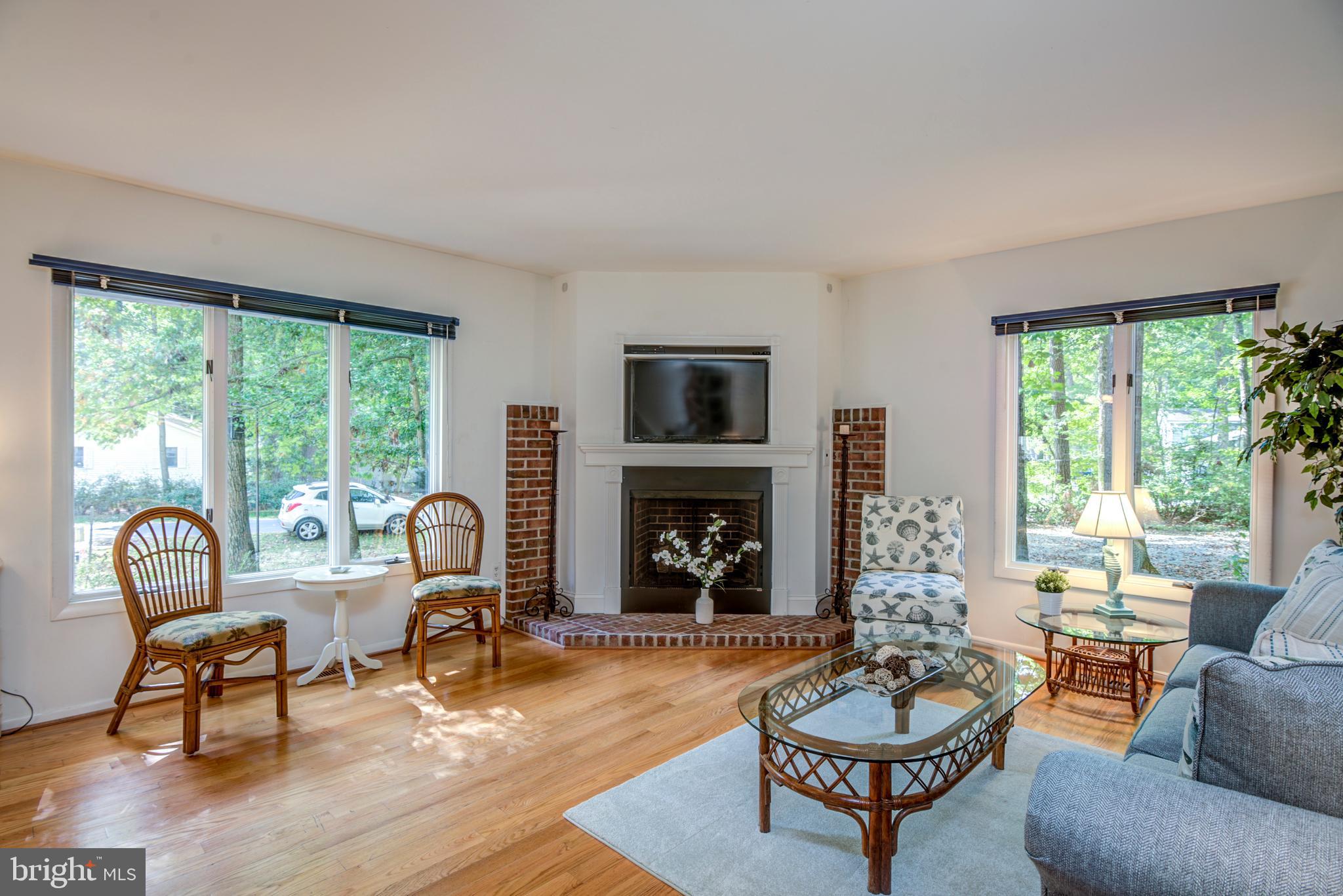 19 Capetown Road Ocean Pines, MD 21811 - Photo 21 of 56 a living room with furniture fireplace and window