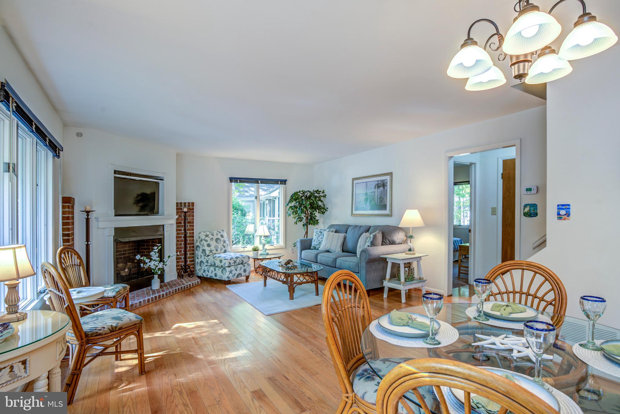 19 Capetown Road Ocean Pines, MD 21811 - Photo 25 of 56 a living room with fireplace furniture and a fireplace