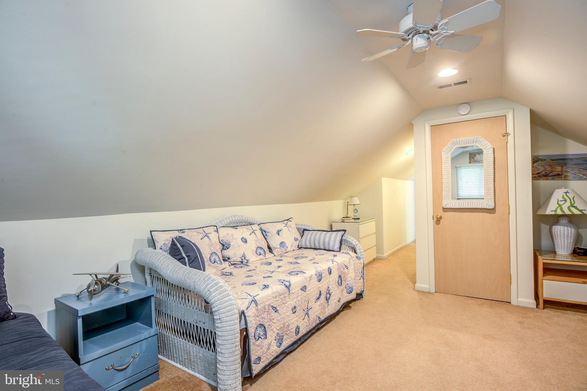 19 Capetown Road Ocean Pines, MD 21811 - Photo 34 of 56 a bed room with a bed and a ceiling fan
