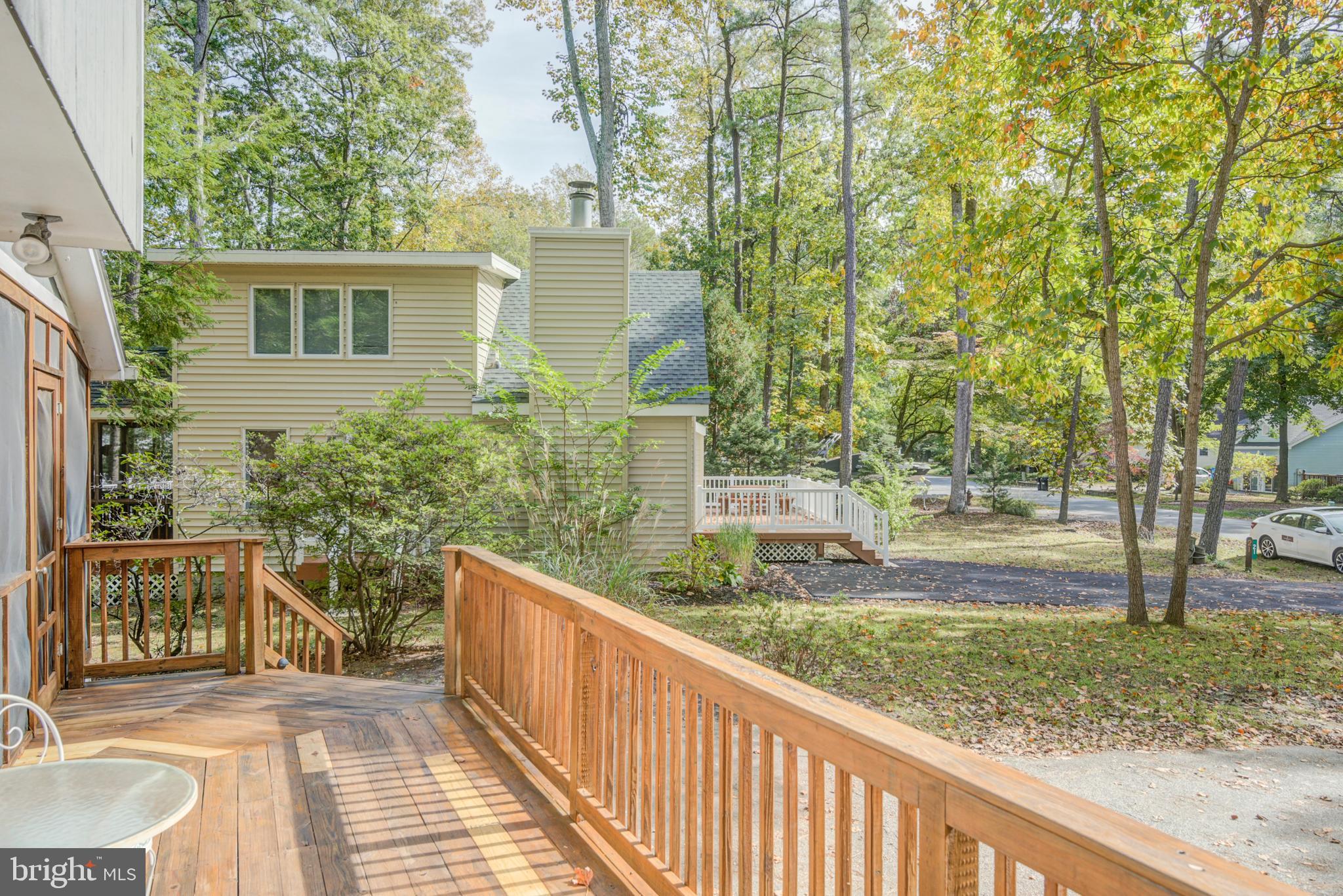 19 Capetown Road Ocean Pines, MD 21811 - Photo 35 of 56 a view of a house with backyard and trees