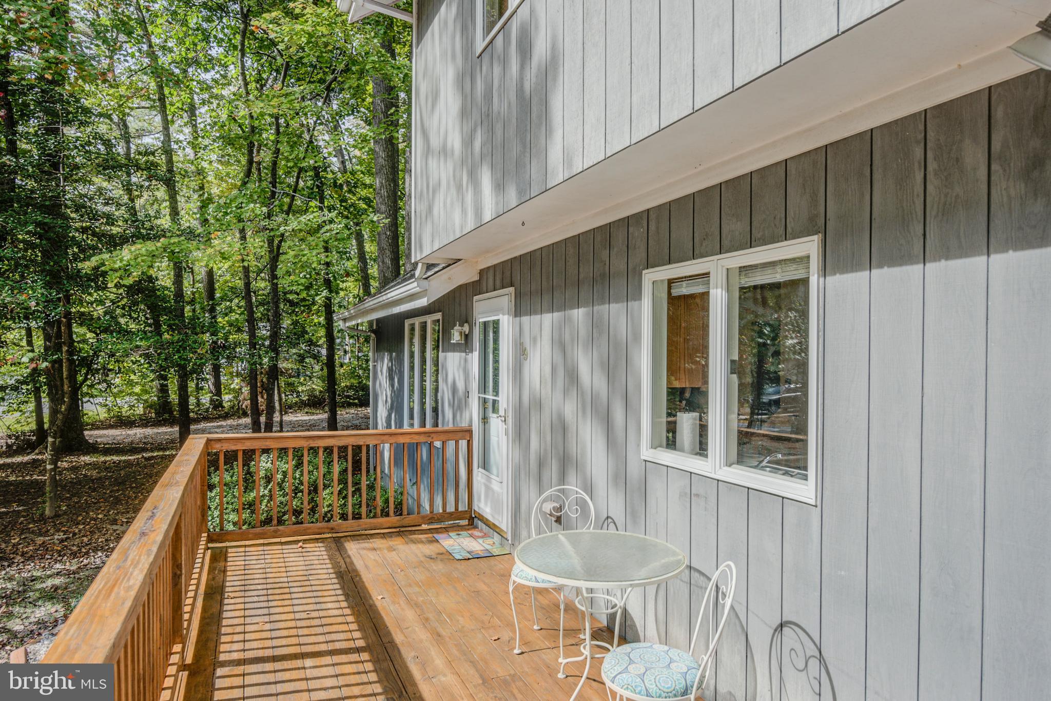 19 Capetown Road Ocean Pines, MD 21811 - Photo 36 of 56 a view of balcony with wooden floor and outdoor seating