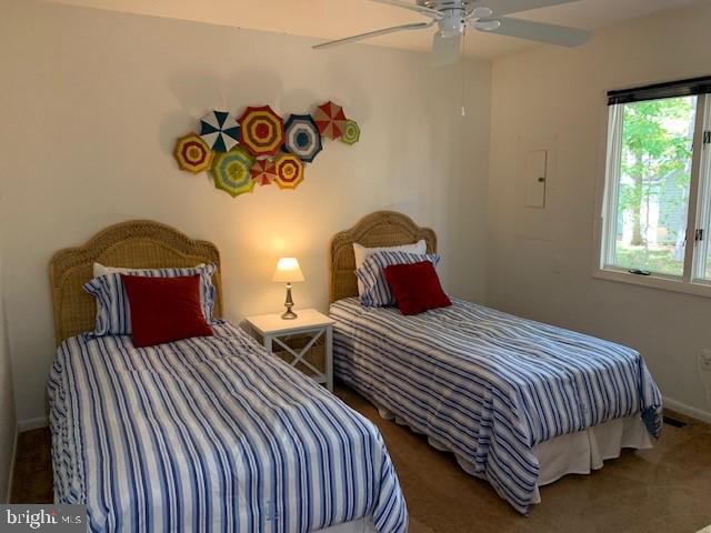 19 Capetown Road Ocean Pines, MD 21811 - Photo 43 of 56 a bedroom with two beds and a table