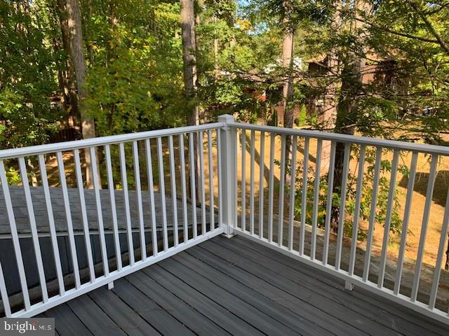 19 Capetown Road Ocean Pines, MD 21811 - Photo 48 of 56 a view of balcony with wooden floor
