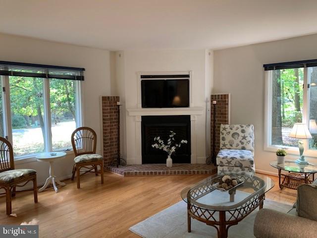 19 Capetown Road Ocean Pines, MD 21811 - Photo 51 of 56 a living room with furniture and a fireplace