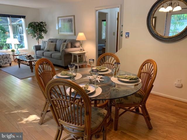 19 Capetown Road Ocean Pines, MD 21811 - Photo 55 of 56 a view of a dining room with furniture and a chandelier