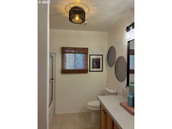 a bathroom with a toilet and a sink