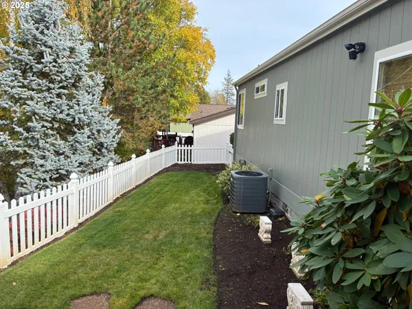 a view of a wooden fence