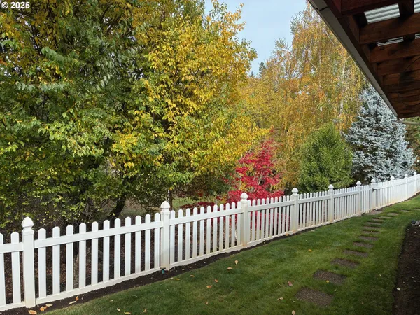 a view of swimming pool with a yard