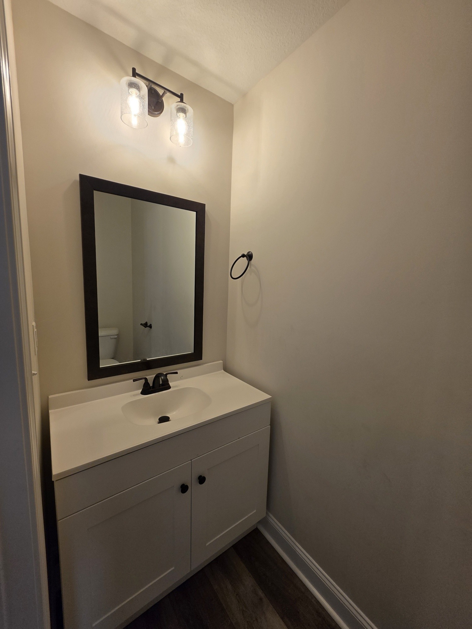 550 Peachers Mill Road, Unit E2 Clarksville, TN 37042 - Photo 5 of 11 a bathroom with a sink and a mirror