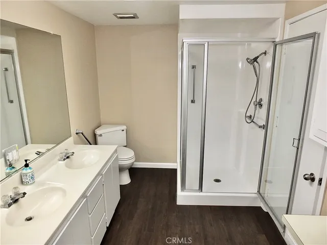 a bathroom with a sink a mirror and a window