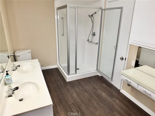 a bathroom with a sink a mirror and a window