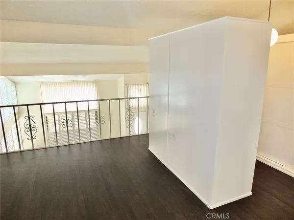 a view of a big yard with a fountain