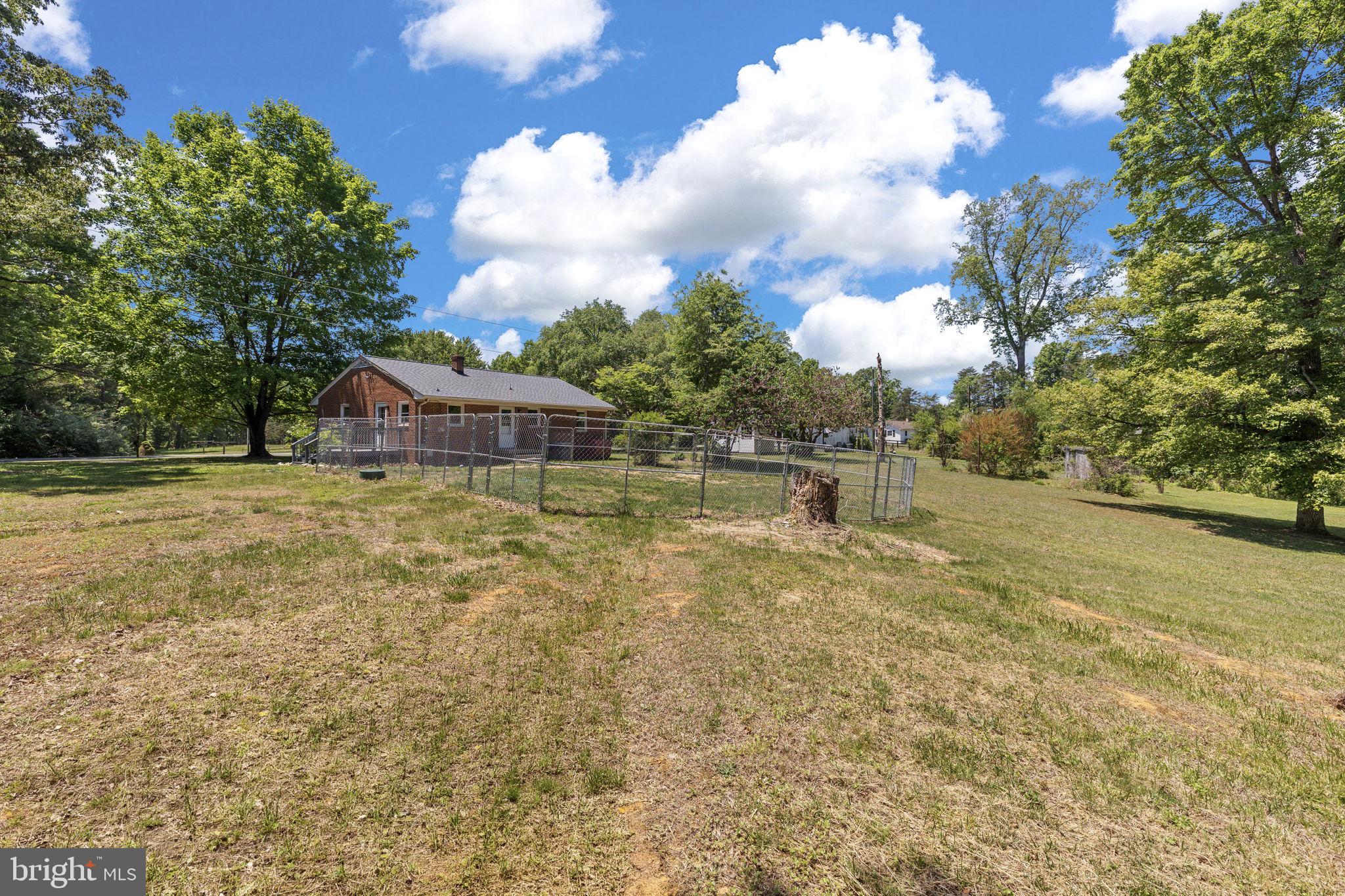 17195 Oakshade Road Orange, VA 22960 - Photo 27 of 31 Spacious yard with charming home backdrop.