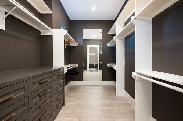 a view of a hallway with a couch