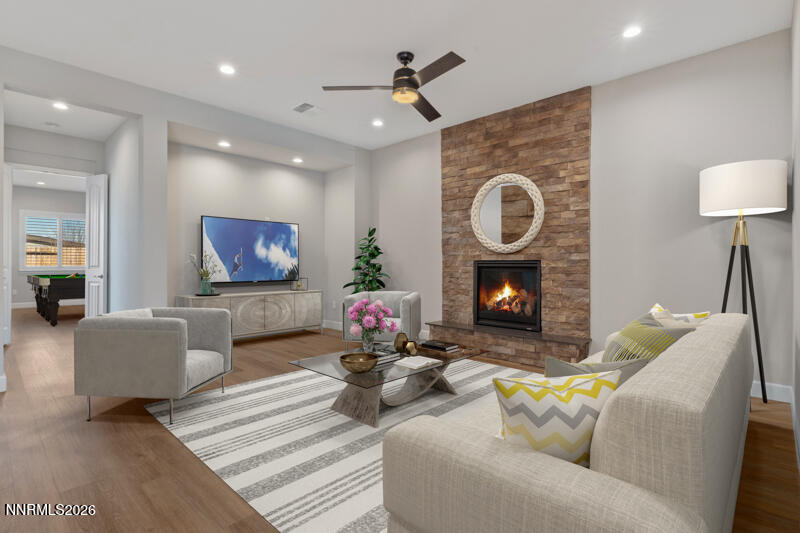 2221 Paint Horse Drive Reno, NV 89521 - Photo 11 of 53 a living room with furniture and a fireplace