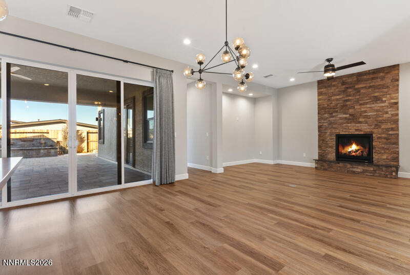 2221 Paint Horse Drive Reno, NV 89521 - Photo 19 of 53 a view of an empty room with glass door and wooden floor