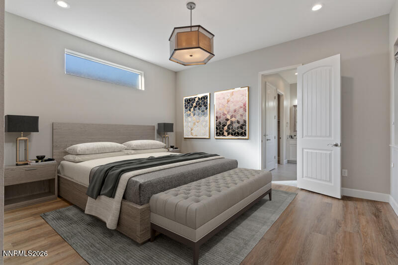 2221 Paint Horse Drive Reno, NV 89521 - Photo 29 of 53 a bedroom with a bed and a painting on the wall