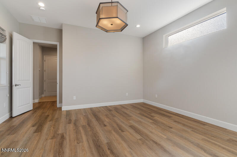 2221 Paint Horse Drive Reno, NV 89521 - Photo 32 of 53 a view of a room with wooden floor and a window