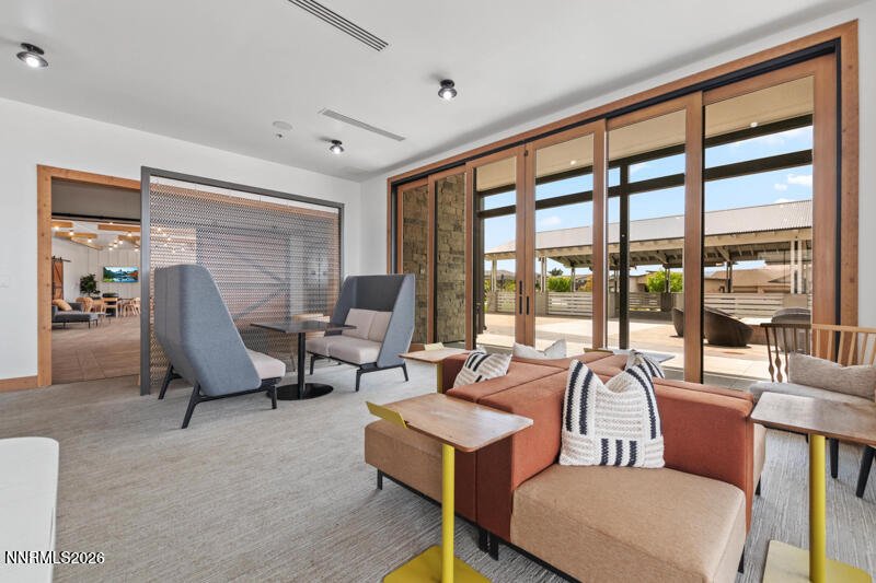 2221 Paint Horse Drive Reno, NV 89521 - Photo 47 of 53 a living room with furniture and floor to ceiling windows
