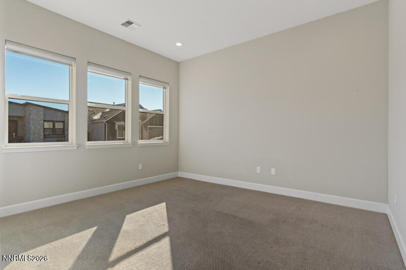2221 Paint Horse Drive Reno, NV 89521 - Photo 6 of 53 a view of an empty room with a window