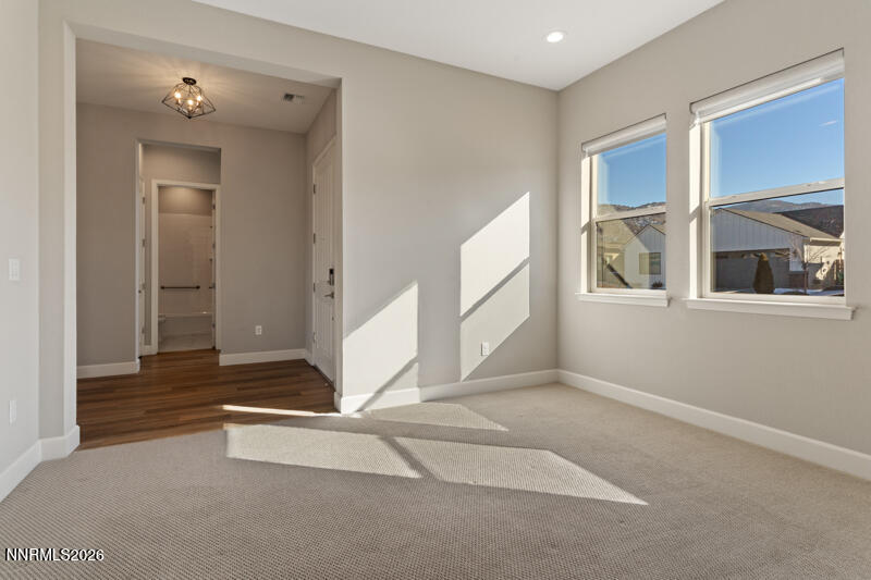 2221 Paint Horse Drive Reno, NV 89521 - Photo 7 of 53 a view of an empty room with a window
