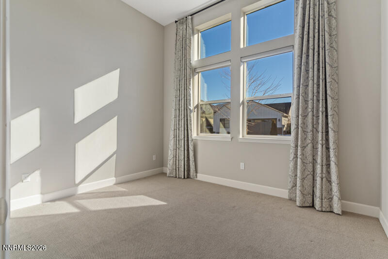 2221 Paint Horse Drive Reno, NV 89521 - Photo 8 of 53 a view of an empty room with a window