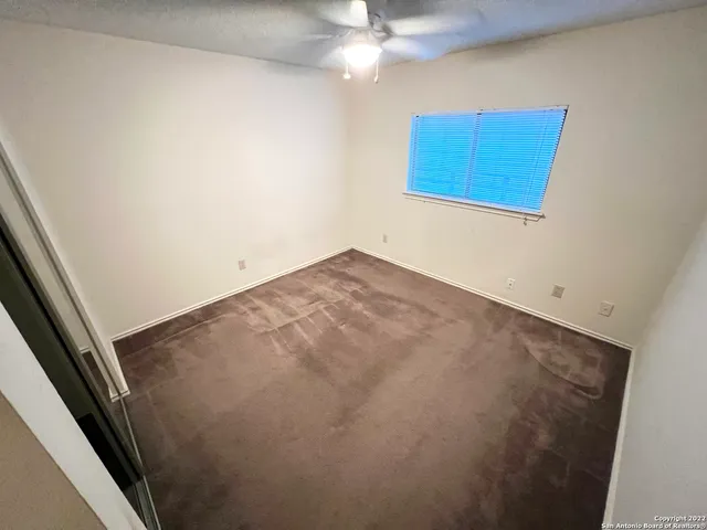 a house with trees in the background