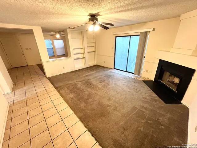 a view of a livingroom with a fireplace