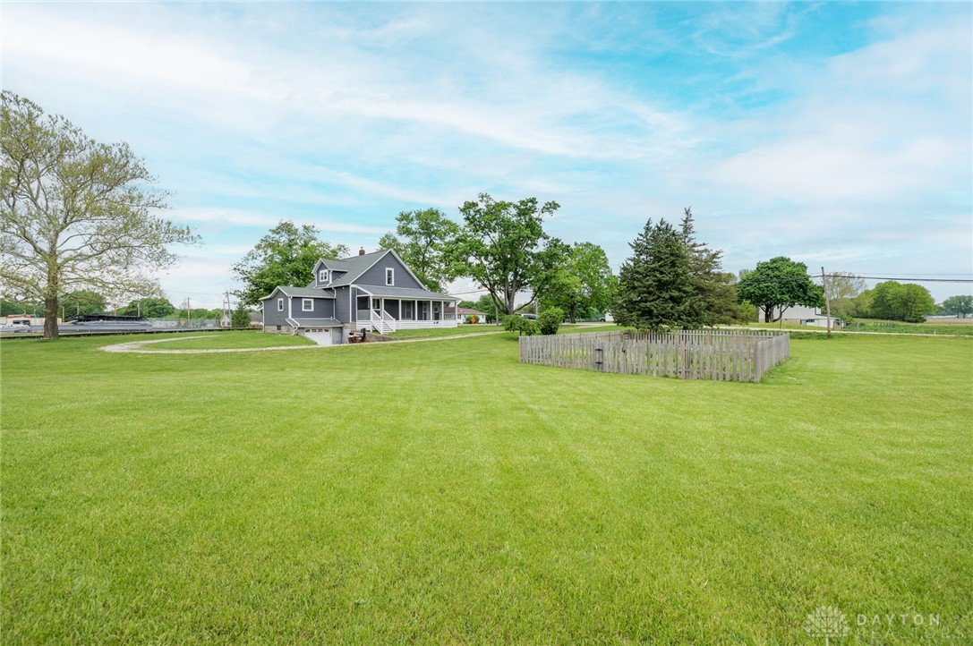 190 Swailes Road Troy, OH 45373 - Photo 78 of 82 This charming home features a broad front porch and a spacious, verdant yard.