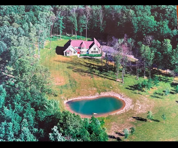 a view of a lake with a yard