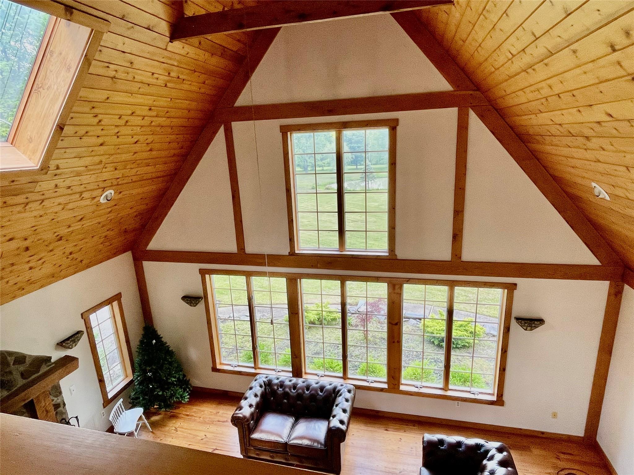 71 Saddleback Ridge Wallkill, NY 12589 - Photo 23 of 39 a living room with furniture and floor to ceiling windows