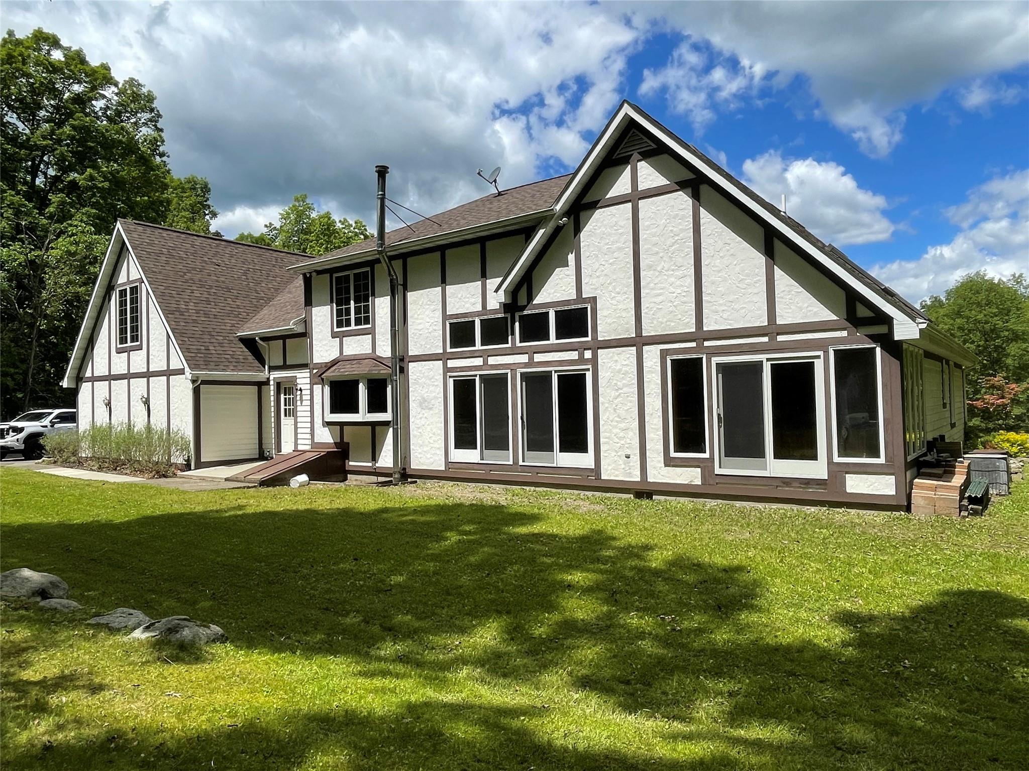 71 Saddleback Ridge Wallkill, NY 12589 - Photo 29 of 39 a front view of a house with a yard