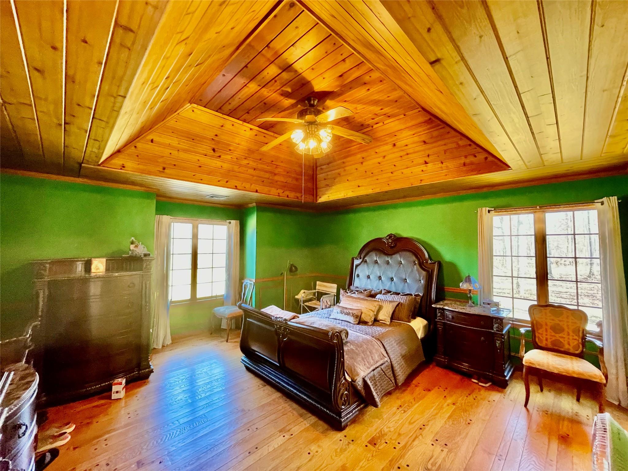 71 Saddleback Ridge Wallkill, NY 12589 - Photo 31 of 39 a bedroom with a bed dresser and a large window