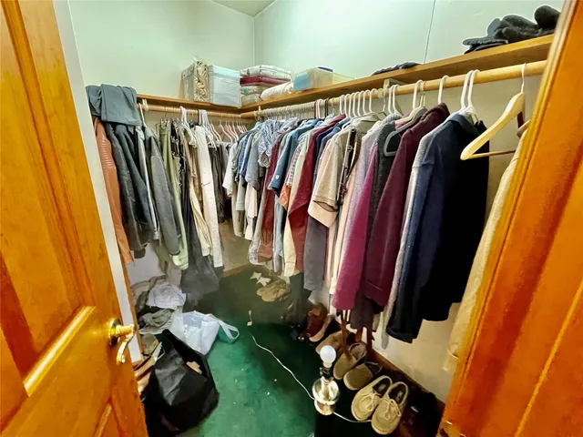 a balcony with table and chairs