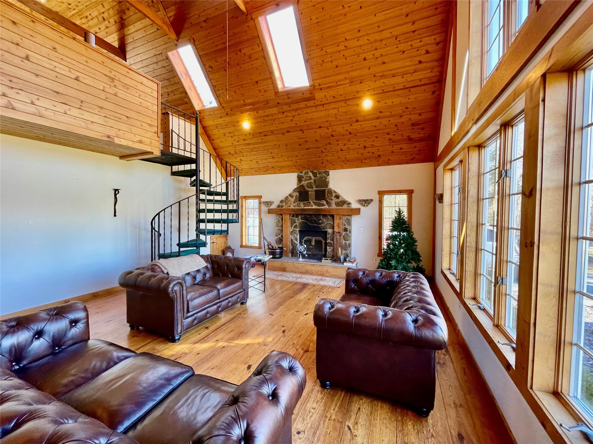 71 Saddleback Ridge Wallkill, NY 12589 - Photo 35 of 39 a living room with furniture fireplace and a large window