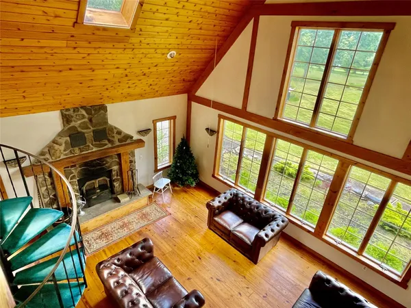 a view of a swimming pool with a yard