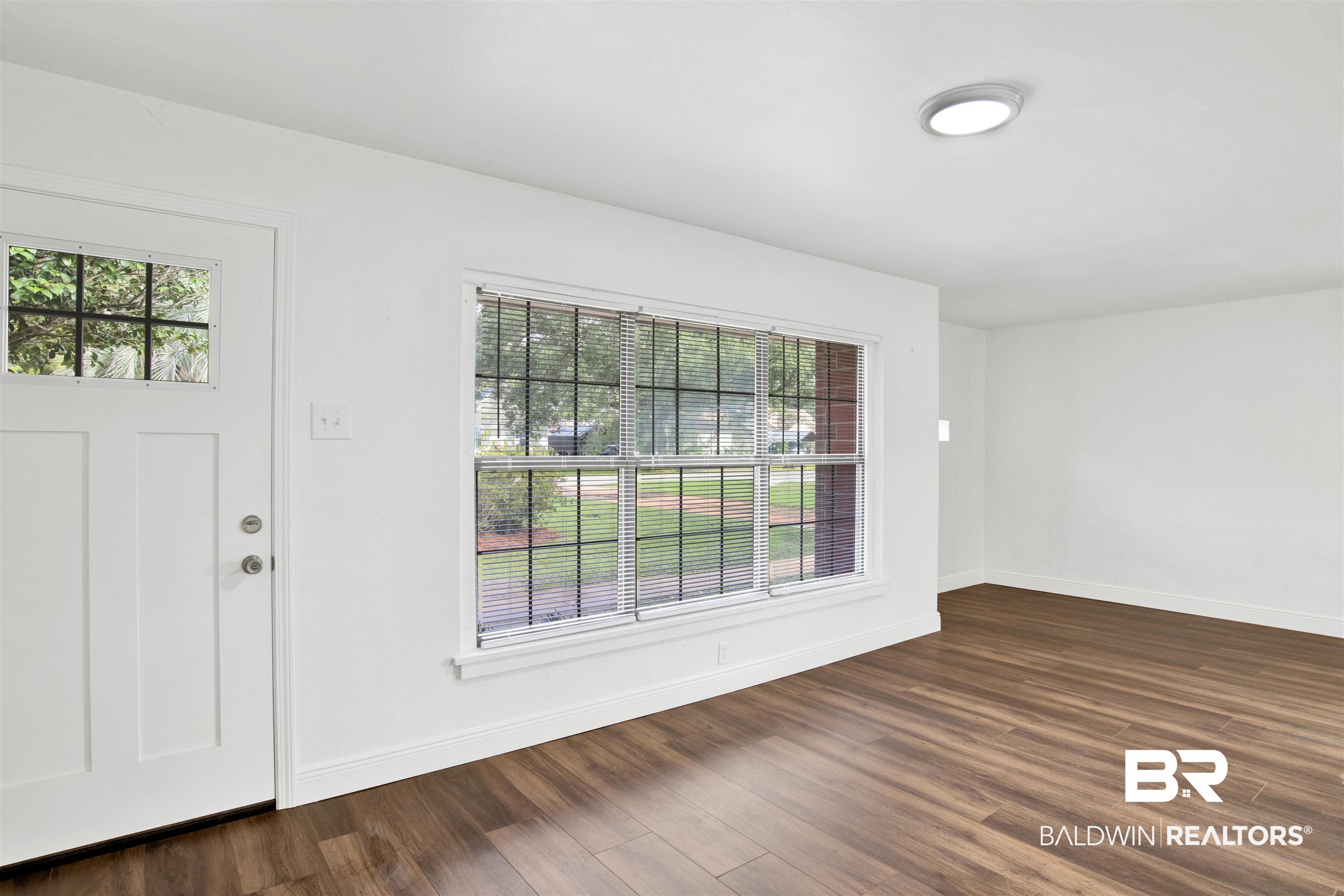 311 West Myrtle Avenue Foley, AL 36535 - Photo 8 of 22 Foyer featuring dark hardwood / wood-style flooring