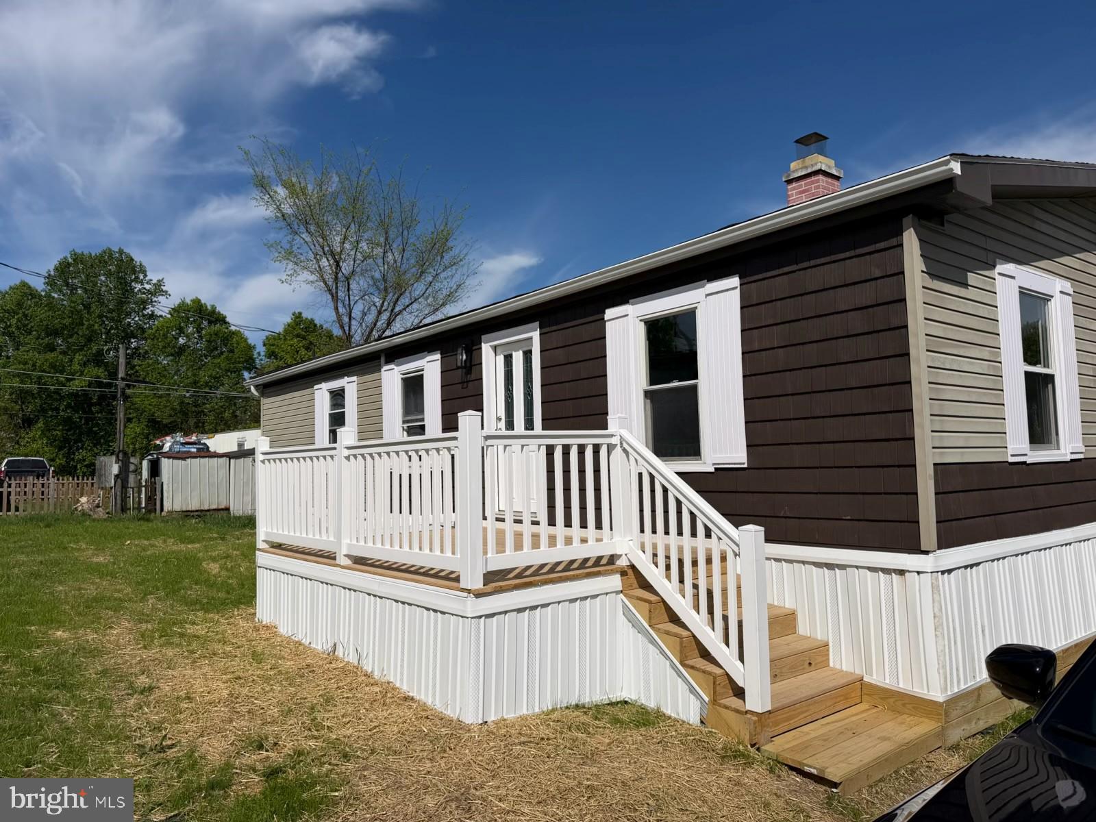 300 Ridge Road, Unit 11 Etters, PA 17319 - Photo 1 of 30 a view of a house with backyard and sitting area