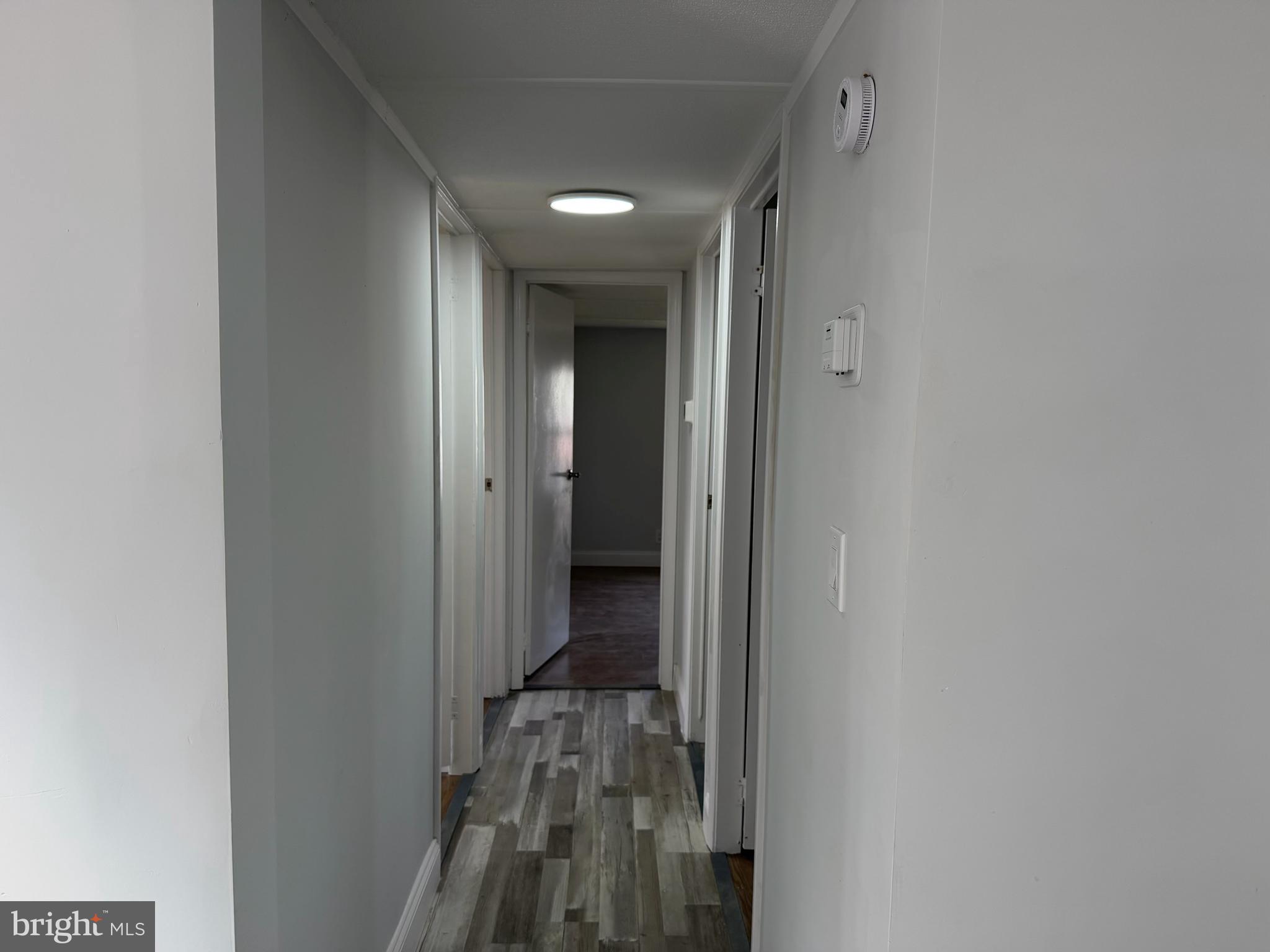 300 Ridge Road, Unit 11 Etters, PA 17319 - Photo 22 of 30 a view of a hallway with wooden floor