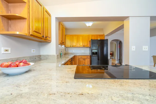 a view of a kitchen with a sink